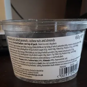 Roasted and salted peanuts, cashew nuts and almonds