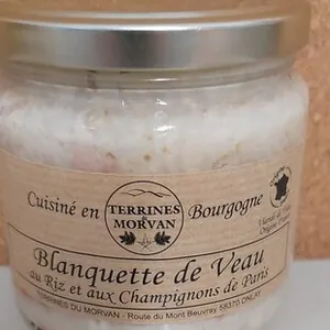 Blanquette de veau aux riz et aux champignons de Paris.