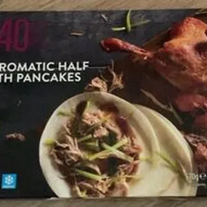 Crispy aromatic duck with pancakes