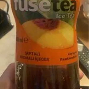 Негазированный безалкогольный напиток с экстрактом чая и со вкусом персика