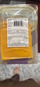 Mimolette cheese slices