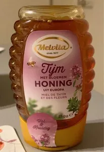 Honing met tijm en bloemen